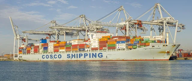 cargo, dock, container, ship, port, trade, freight, export, logistics, transport, maritime, merchandise, commercial, international, crane, portico, france, haven. Branded merchandise exports to the EU after Brexit