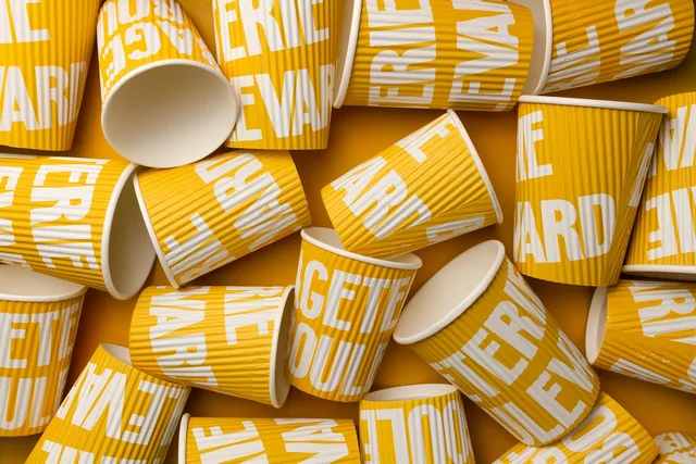yellow cups, paper cups, eco-friendly cups, plastic-free, flat lay, paper cups, paper cups, paper cups, paper cups, paper cups. Eco-friendly promotional products UK: what to ask suppliers before you order